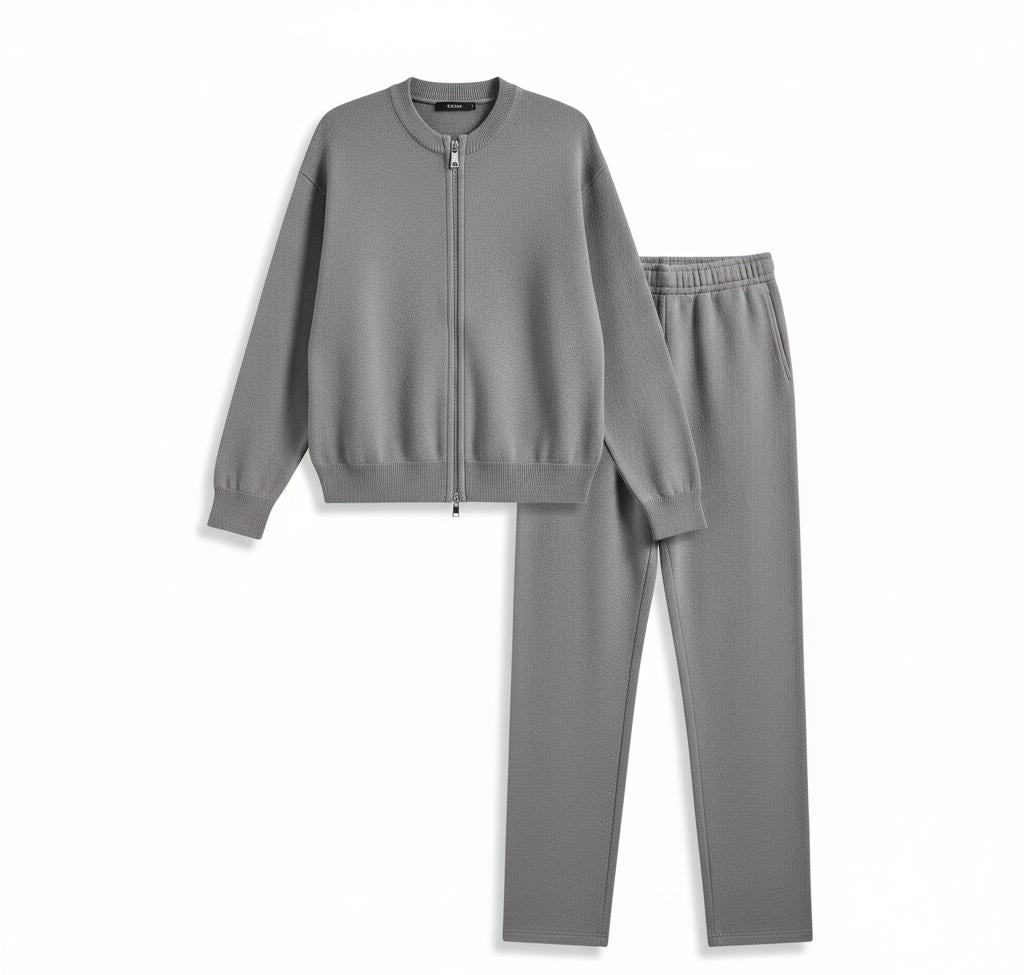 Men's gray textured knit tracksuit with zip-front long-sleeve sweater and straight-leg elastic-waist pants.