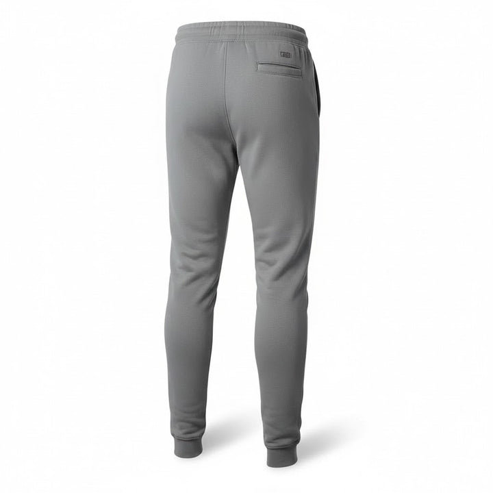 Men's modern style grey sweatpants with elastic waist, functional pockets, and ribbed cuffs.